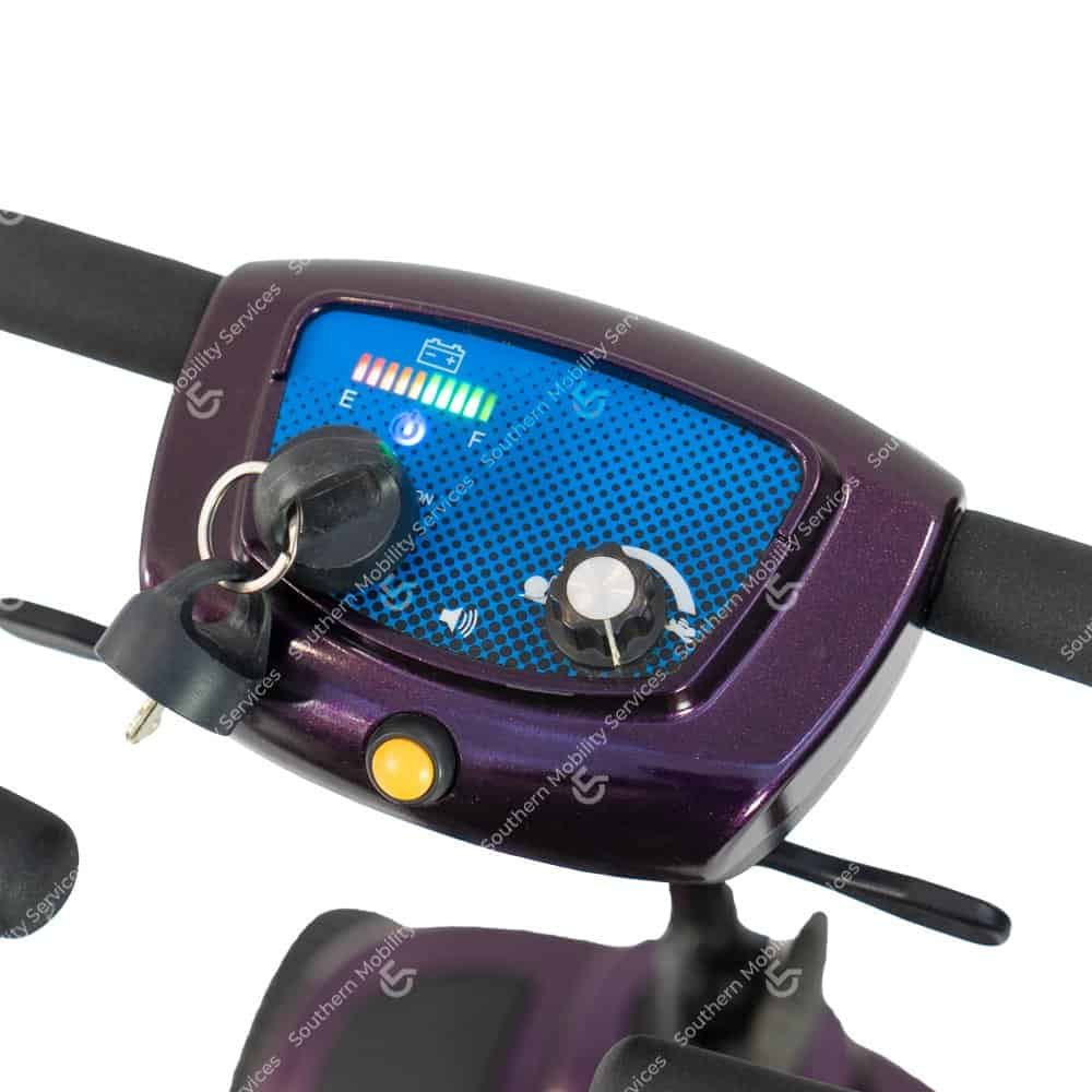 Used purple vouge portable mobility scooter tiller